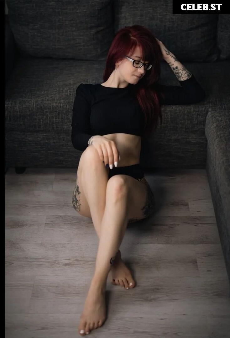 tattooed_redhead Image 2733840